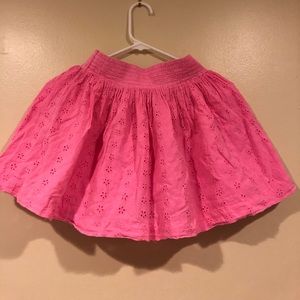 Woman’s small pink lace short skirt